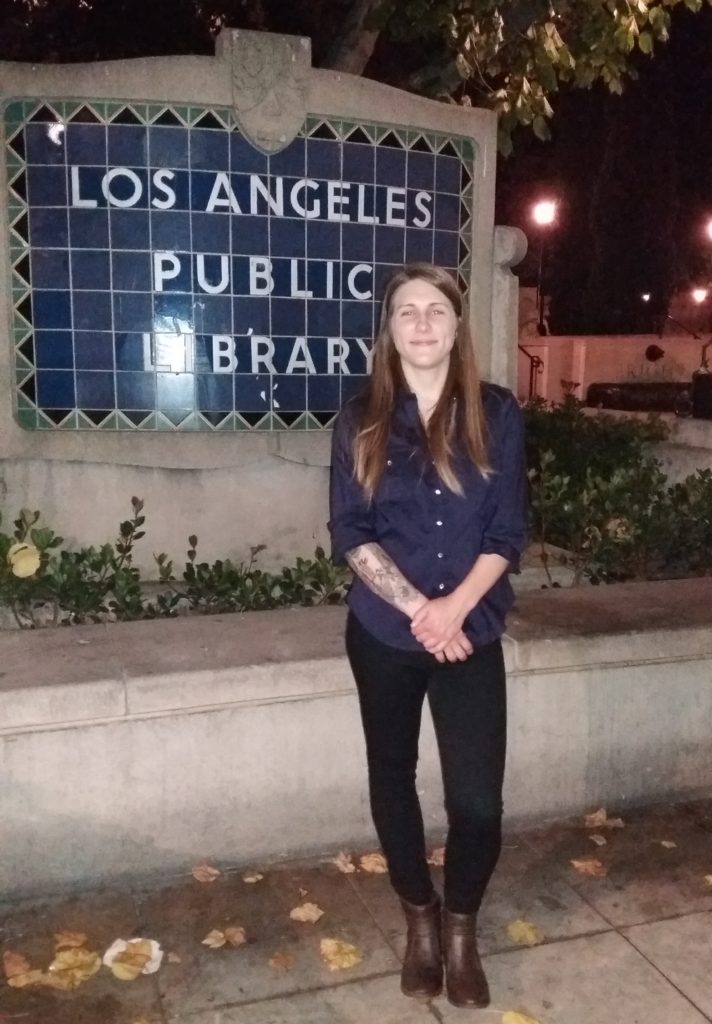 Photo of writer Hannah Huff outside the Los Angeles Public Library, one of 10 SoCal literary landmarks.