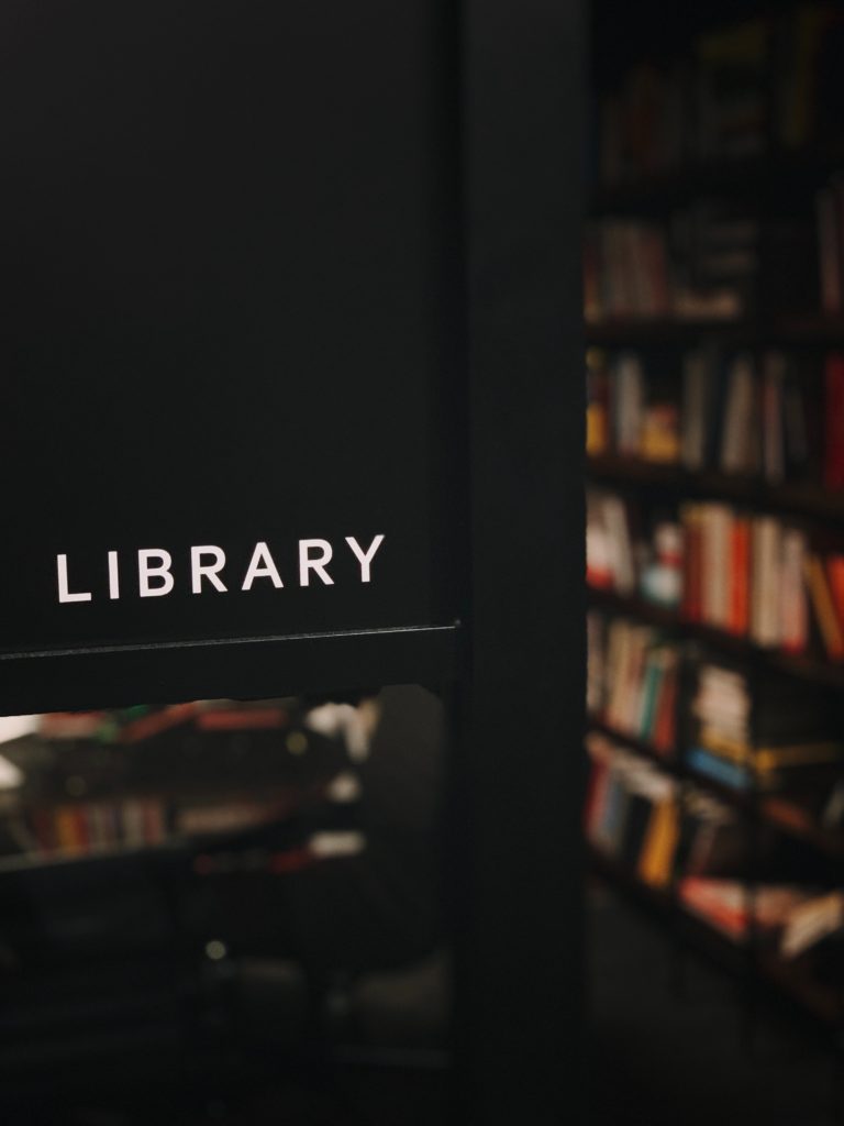Image of library sign to show literary landmarks hosting live poetry readings.