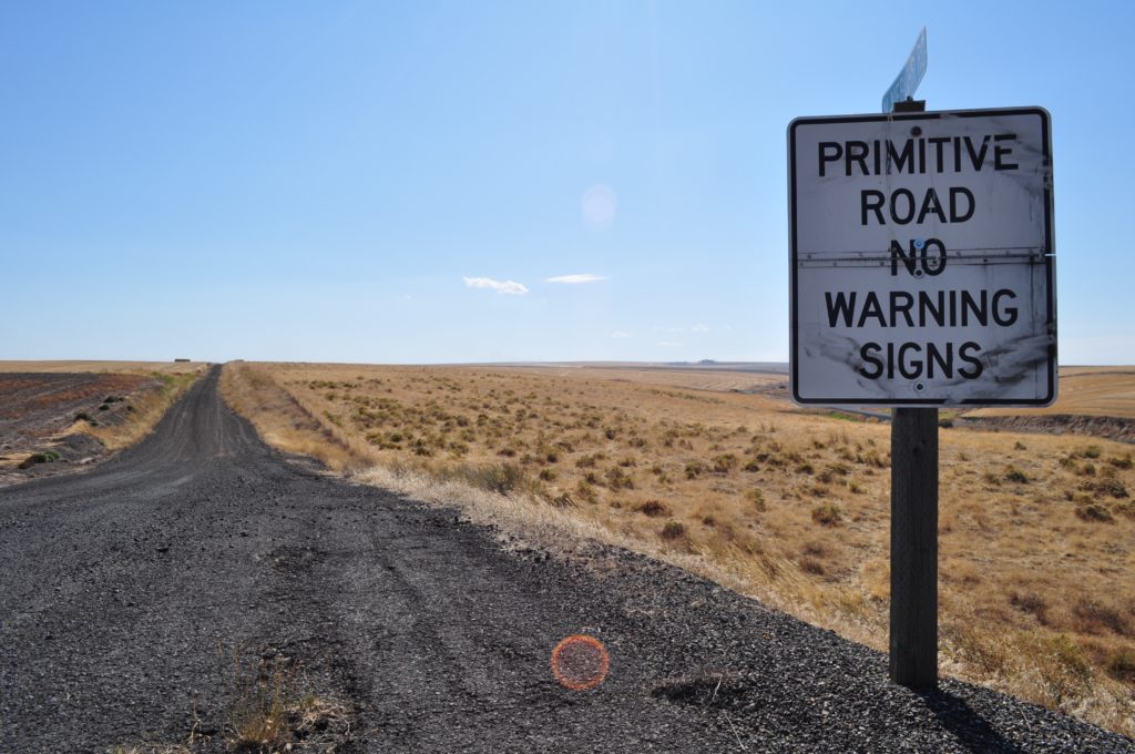 Photo of poetic road signs on Notes of Oak Literary Resources Blog