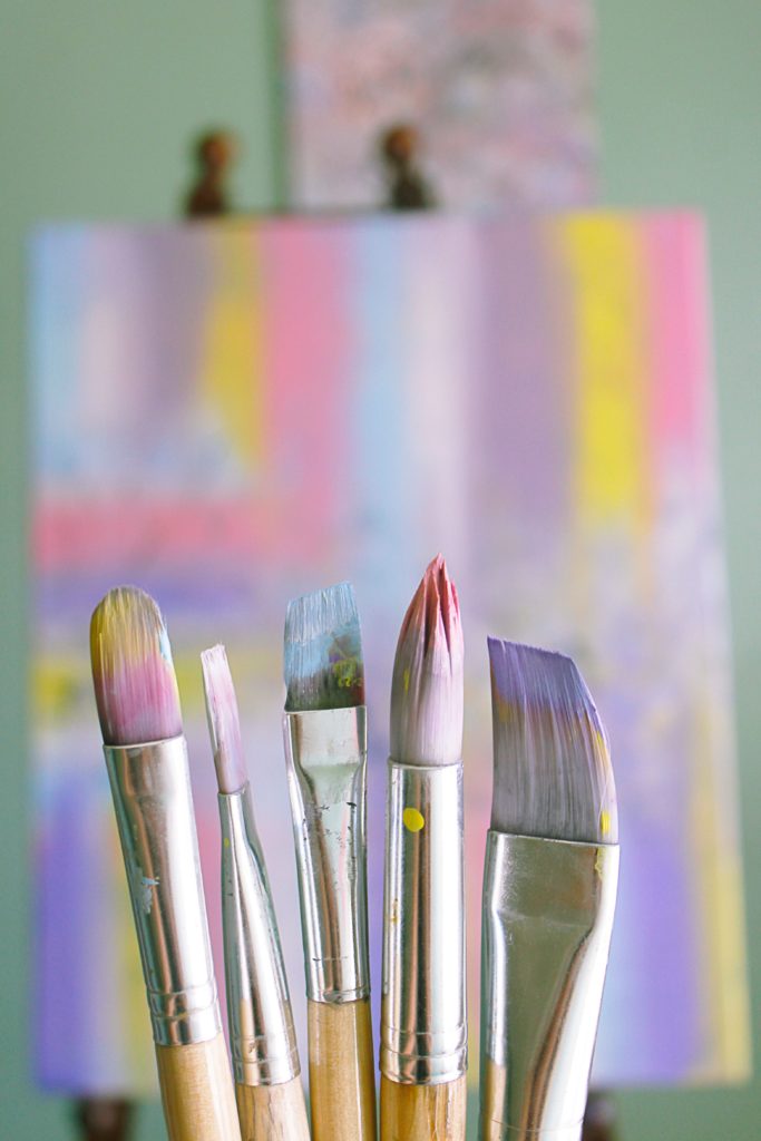 Photo of colorful paintbrushes representing ekphrastic poetry details