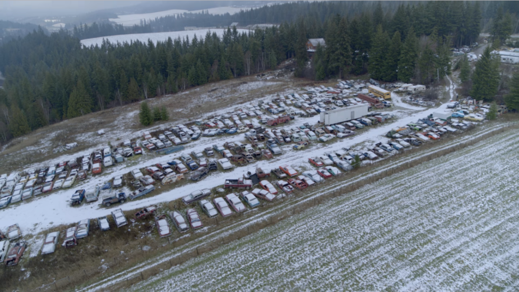 Overhead image of Mike Hall's car collection in winter.